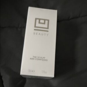 beautycounter white and silver The Sculpt Arm Compound